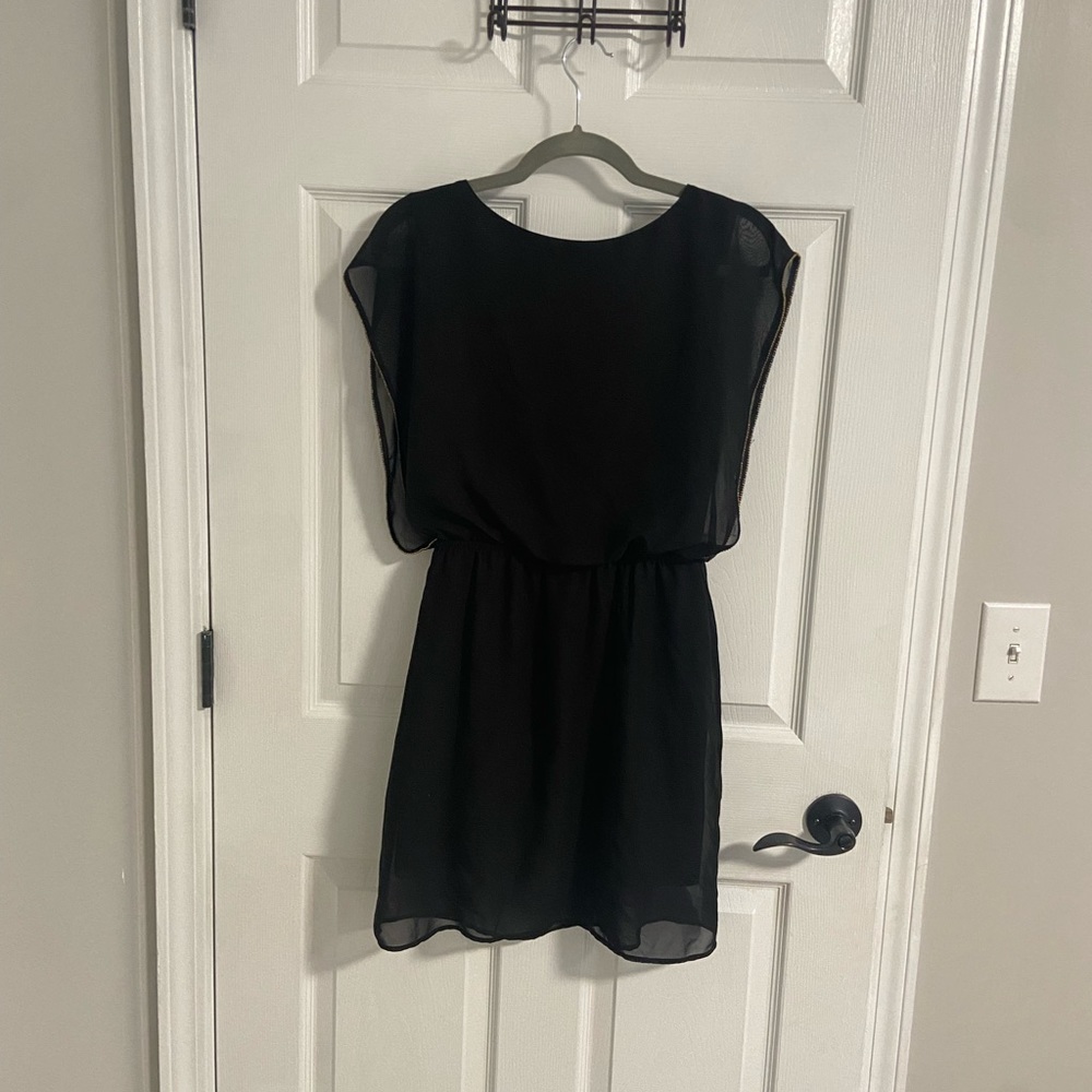 Black Dress with Sheer Overlay and Gold Accents